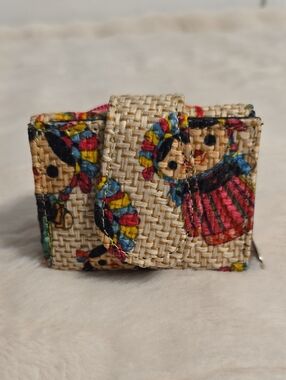 Woven Cartoon Doll Print Mini Wallet - Cream with Red & Blue Accents.